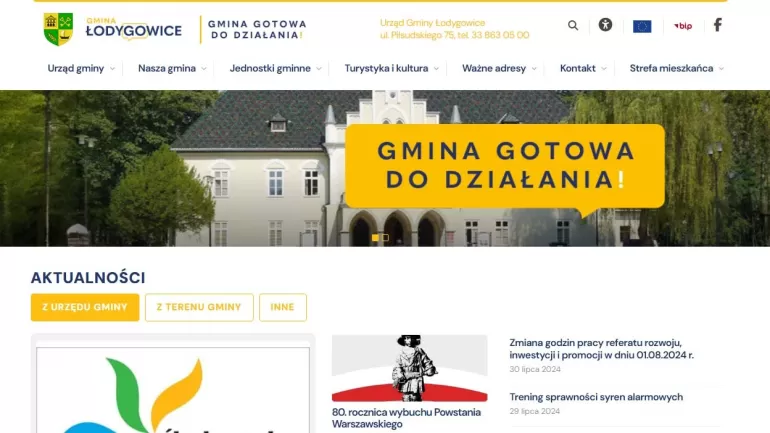 Logo gminy Łodygowice widoczne na stronie internetowej Urzędu Gminy Łodygowice (www.lodygowice.pl)
